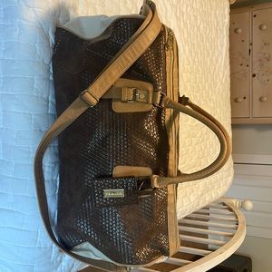 Brown and tan Steve Madden duffle  adjustable shoulder strap